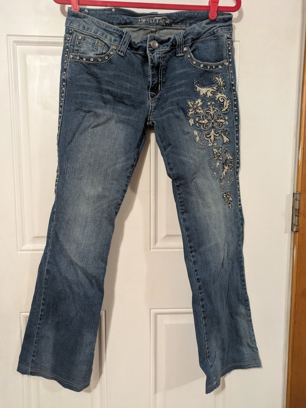 Embroidered Blue Boot-Cut Jeans with Stud Accents